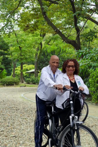 johnnie and sallie cheston on a bike